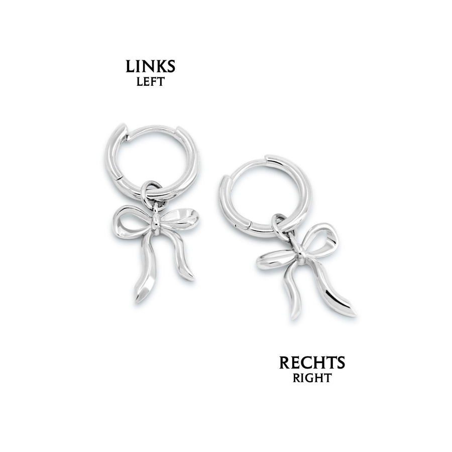 Schleifen Ohrringe aus 925 Silber, alternativer und Gothic-inspirierter Schmuck, zarte silberne Creolen mit Schleifen-Design für Damen von Pour la Rebelle.
